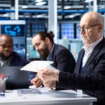 Corporate finance consultants in Dubai UAE analyzing financial data and business reports